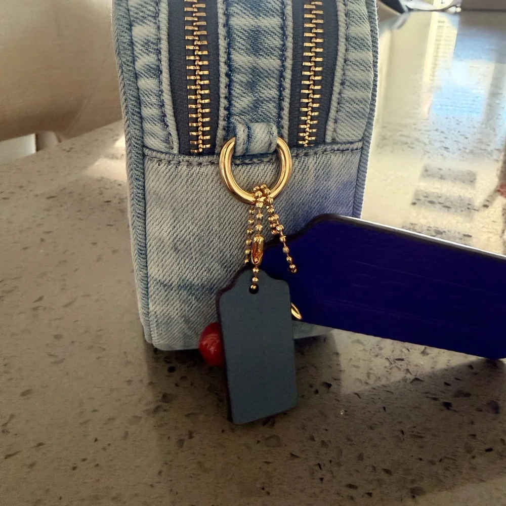 Coach Light Denim Crossbody with Purple Tag and Red Charm
